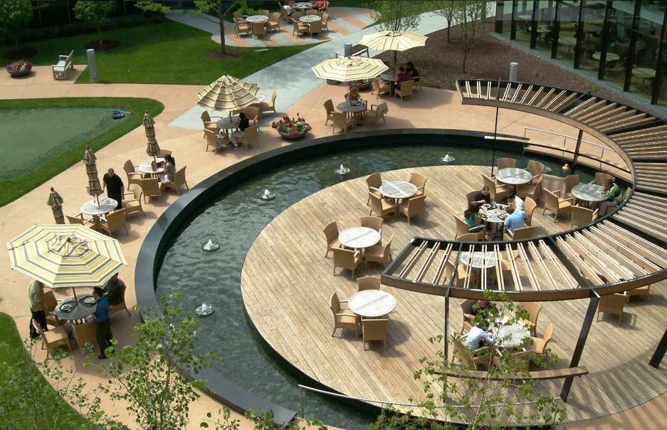 Podium-level landscaped court with outdoor dining, developer's render